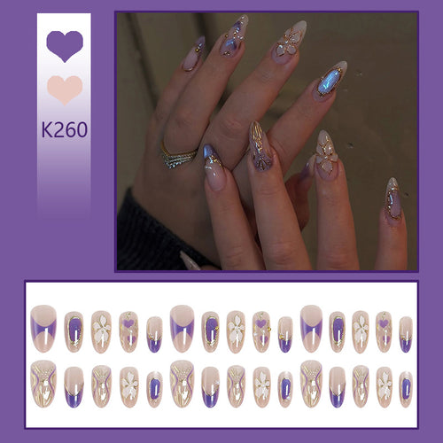 Elegant artificial nails with floral design and color accents Bowlift