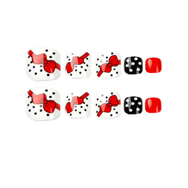 Artful toenail design with elegant bow motifs Bowlift