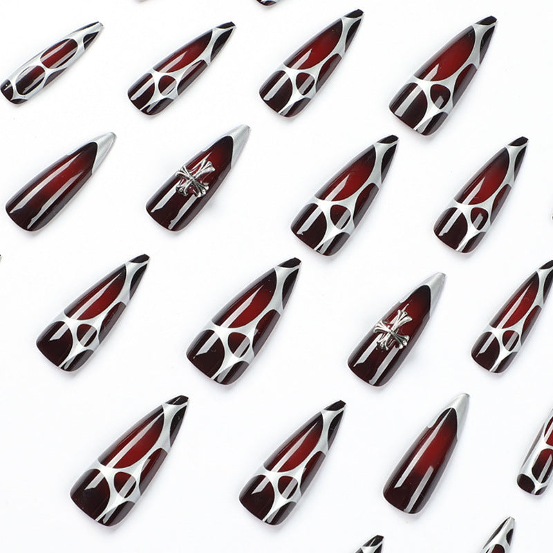 Artful Stiletto Nails with Elegant Cross Decoration Bowlift