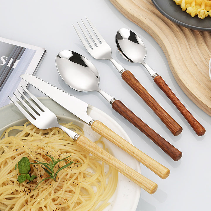 Elegant serving spoon with ergonomic wooden handle Bowlift