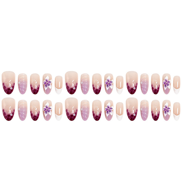 Artificial nails with elegant ombre effects and floral accents Bowlift