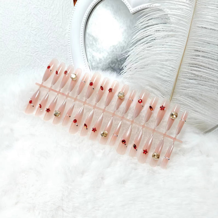 Artificial nails with sparkling 3D decorations Bowlift