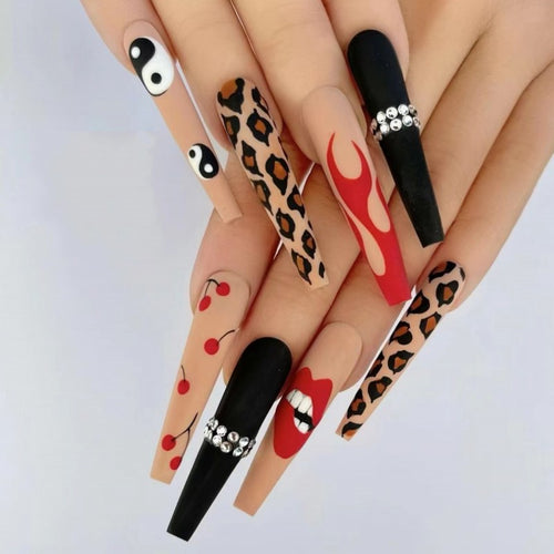 Artificial nails in creative designs with animal and face motifs Bowlift