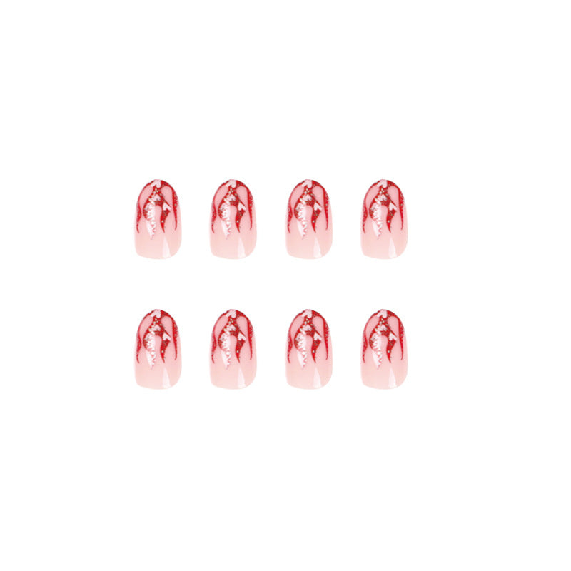 Artificial nail art with romantic heart and flame design Bowlift