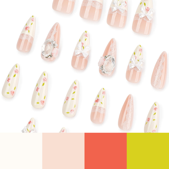 Artful stiletto nails with floral accents and glitter accents Bowlift