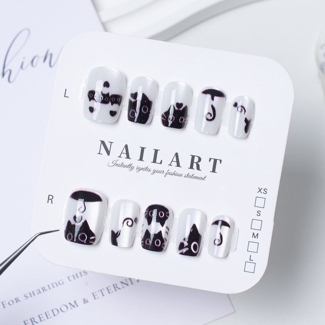 Decorative Press-On Nail Extensions with Bow and Rhinestone Accents Bowlift