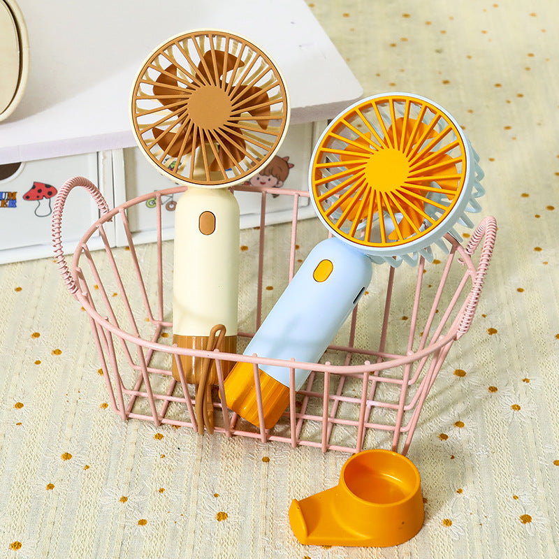 Women's Portable Mini Fan with Ergonomic Grip and USB Charging Function Bowlift