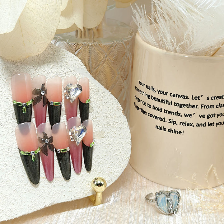 Artificial nails with elegant tip design and glitter accents Bowlift