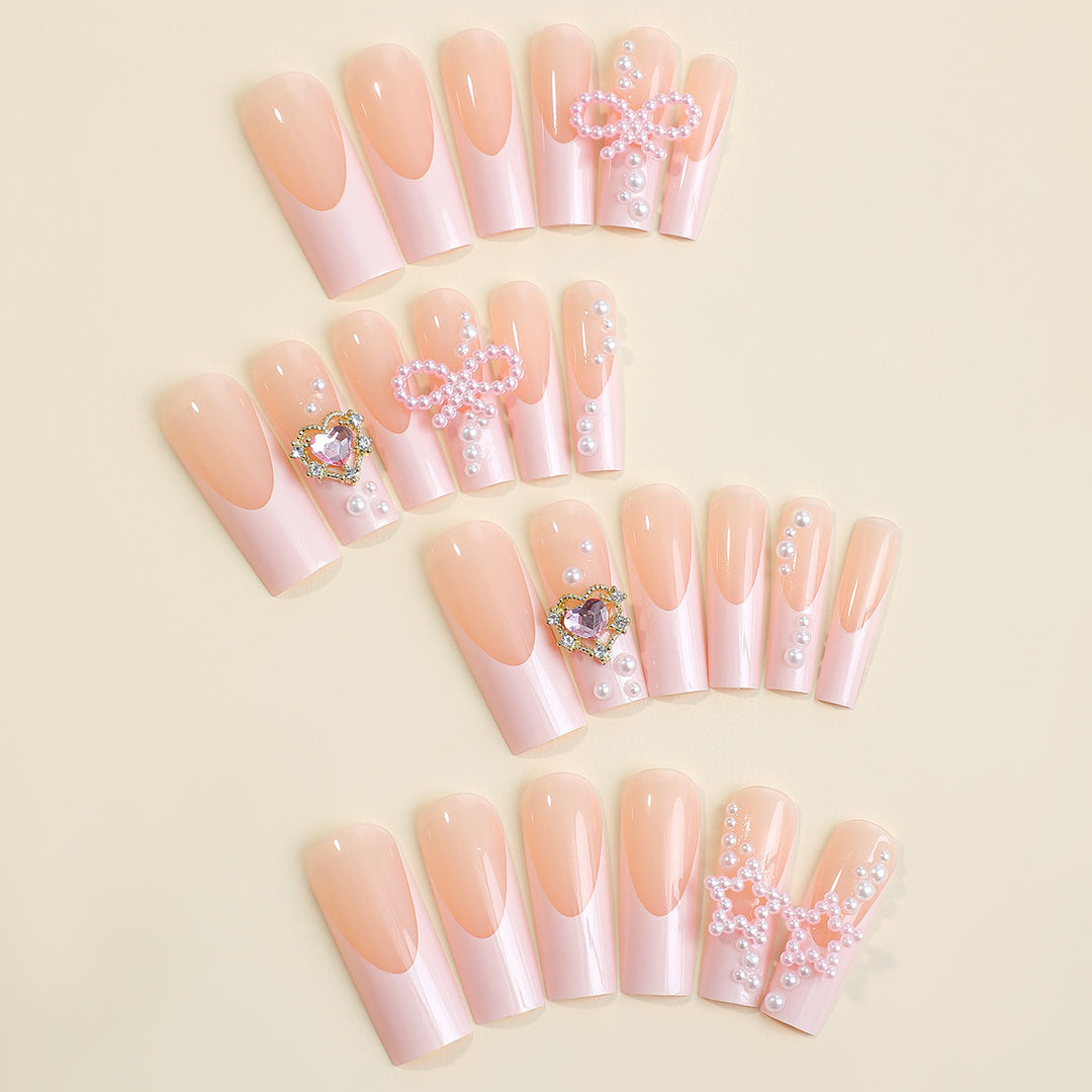 Luxury artificial nail set with glamorous embellishments Bowlift