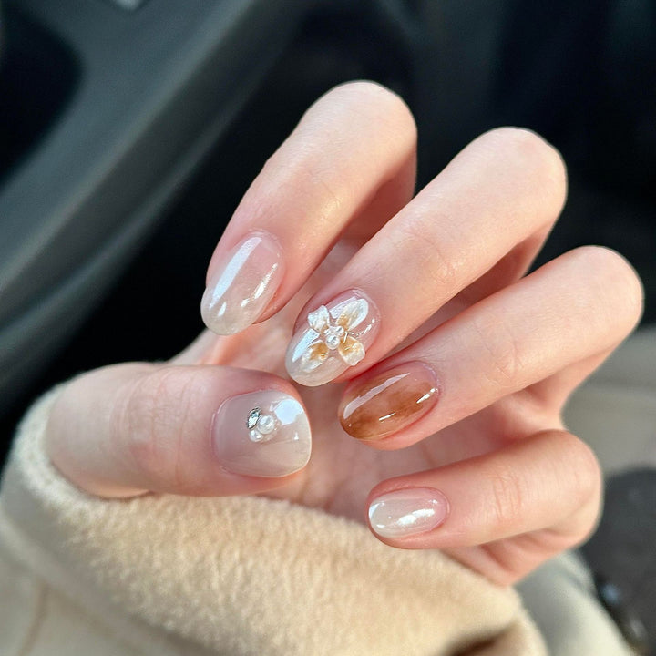 Artificial nails with floral details and glitter coating Bowlift