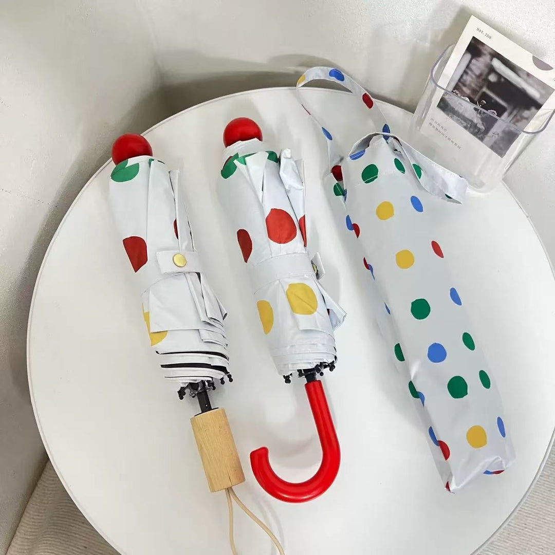 Ladies designer foldable umbrella with colorful polka dot pattern Bowlift