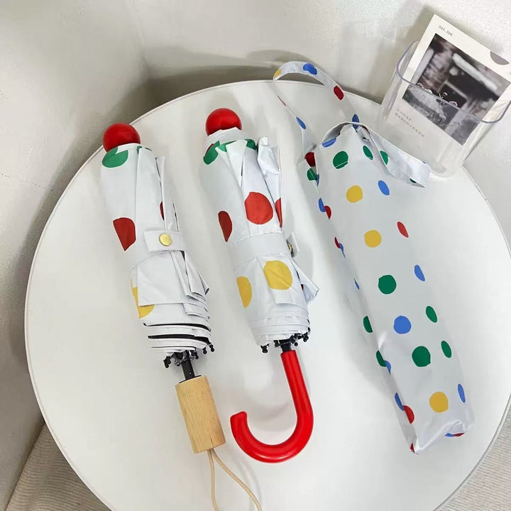 Ladies designer foldable umbrella with colorful polka dot pattern Bowlift