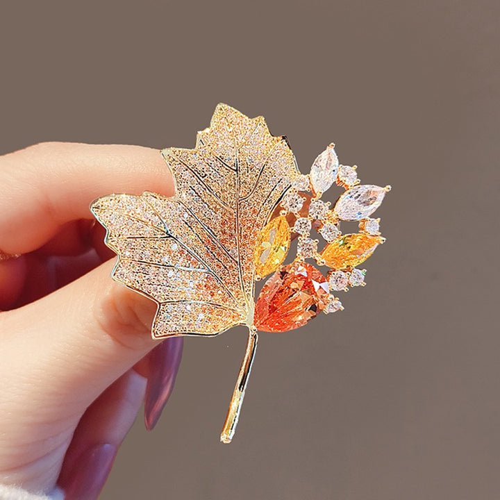 Exquisite leaf brooch with sparkling crystals Bowlift