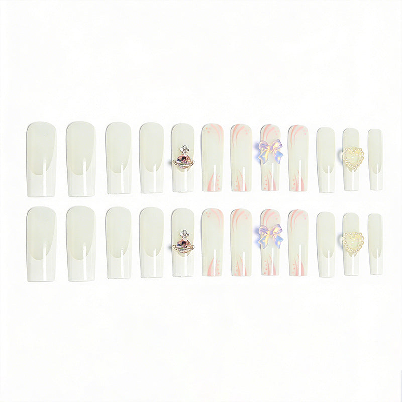 Artificial nails with delicate embellishments Bowlift