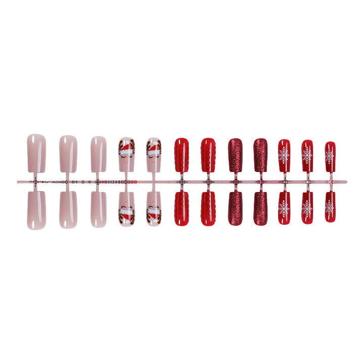 Artificial nail set with festive Christmas designs and glitter accents Bowlift