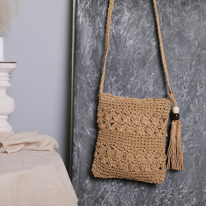 Handmade macrame shoulder bag with tassel detail Bowlift