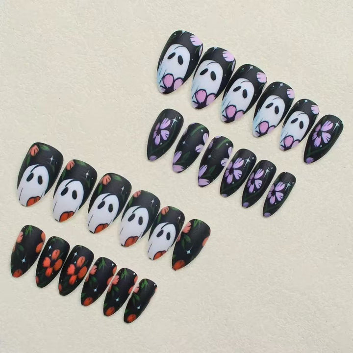 Artificial nail set with floral and spooky designs Bowlift