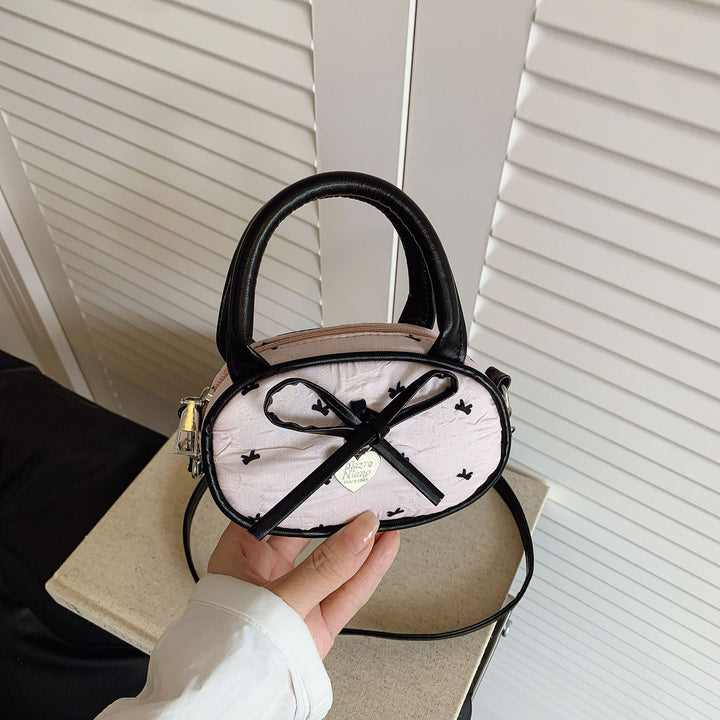 Quilted Mini Handbag with Heart Detail Bowlift