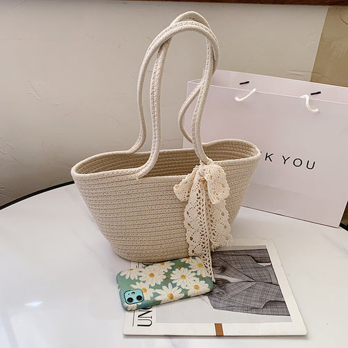 Elegant Bast Handbag with Lace Accent Bowlift