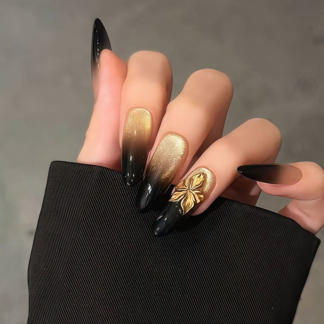 Glamorous artificial nails with intricate flower and glitter effects Bowlift