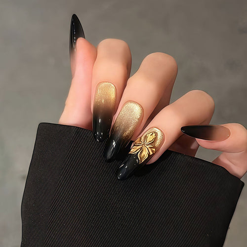 Glamorous artificial nails with intricate flower and glitter effects Bowlift