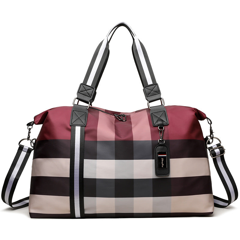 Sporty travel bag with intelligent compartment design Bowlift