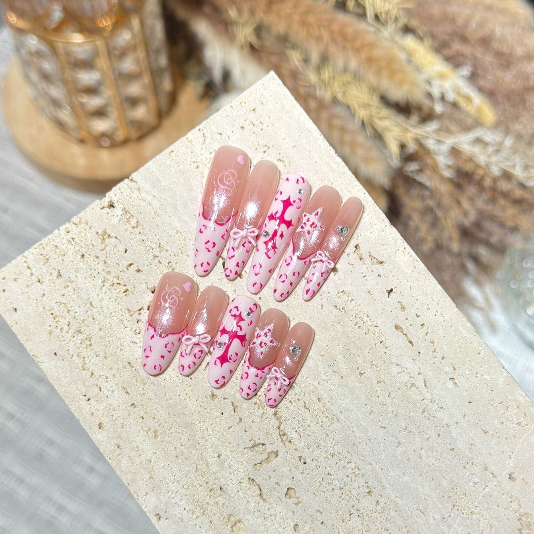 Artistic Stiletto Press-On Nail Set with Heart and Bow Design Bowlift