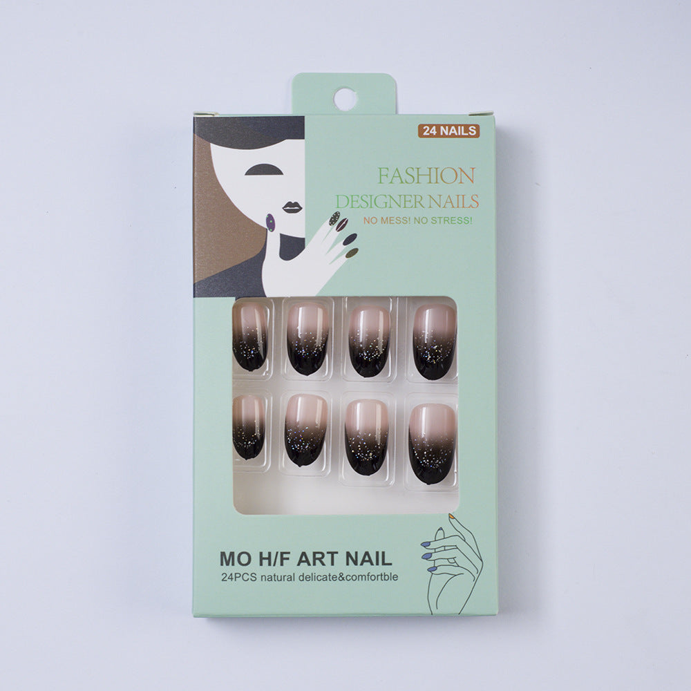 Elegant artificial nails in modern ombre style with glitter accents Bowlift