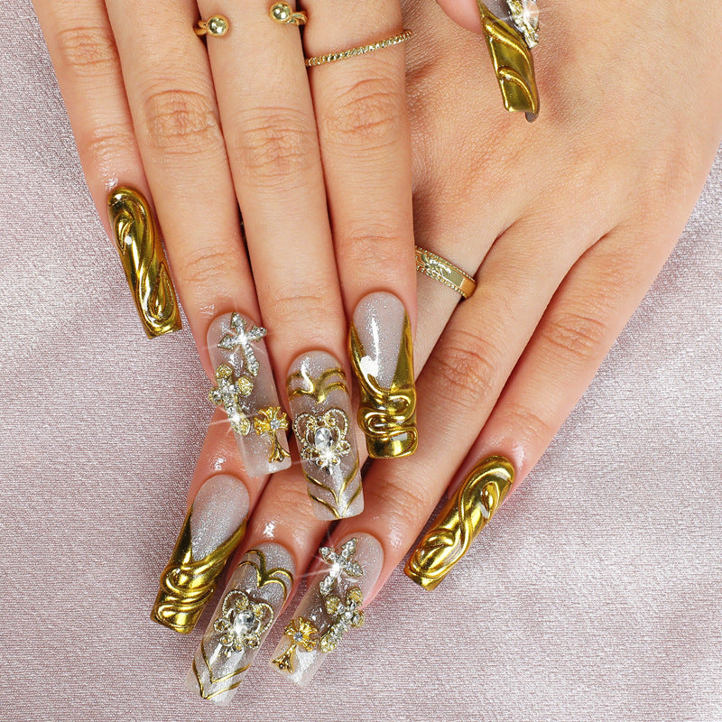 Artificial nail set with luxurious gold embellishments Bowlift