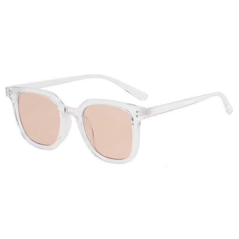 Women striking retro sunglasses with yellow-tinted lenses Bowlift