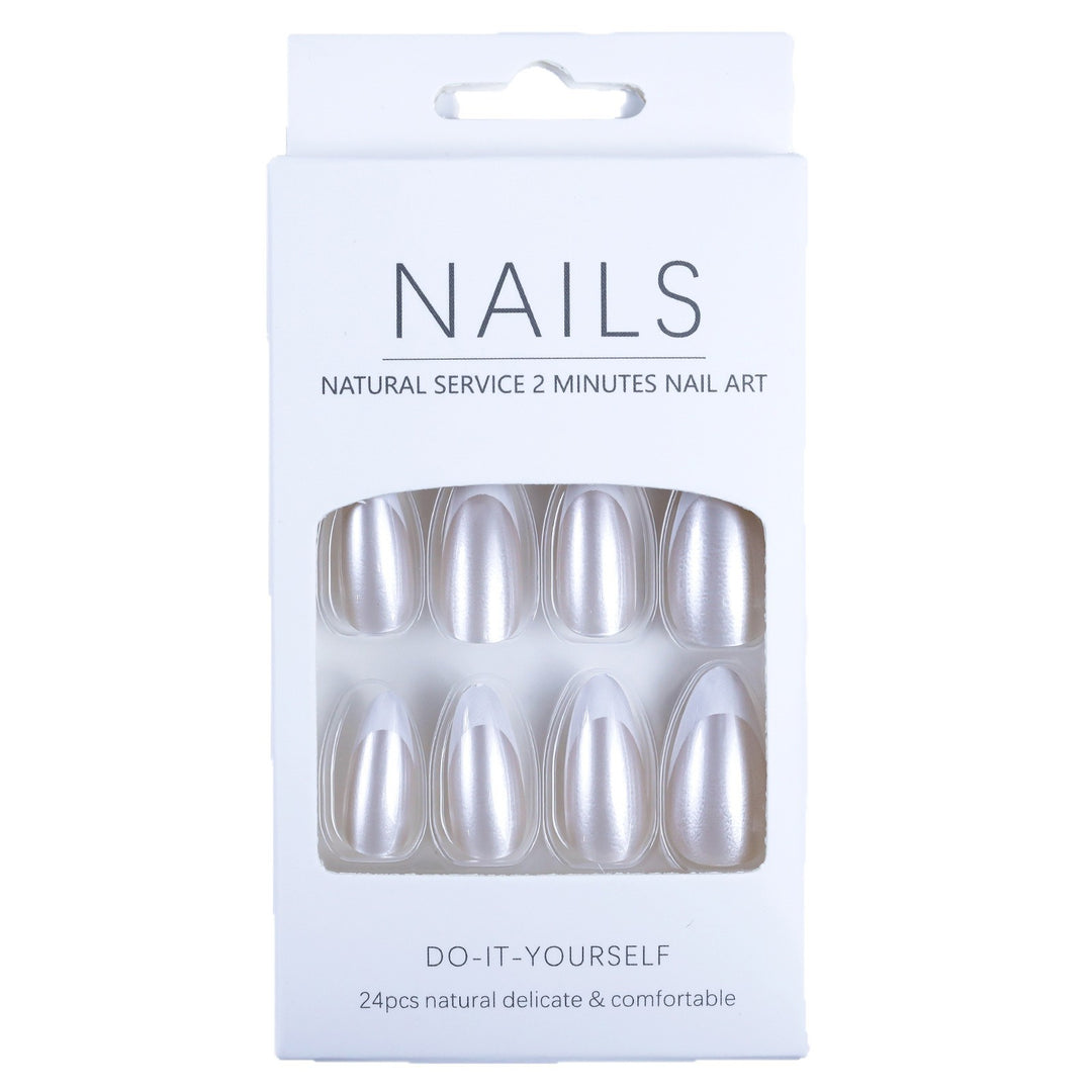 Artificial nails in elegant French tip design Bowlift