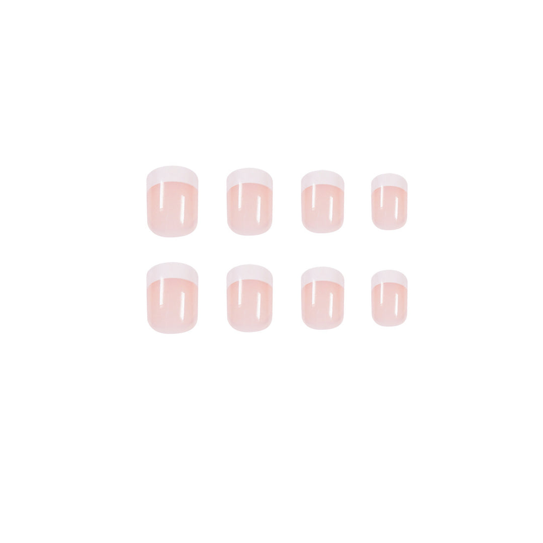 Artificial nails in French Tip design Bowlift