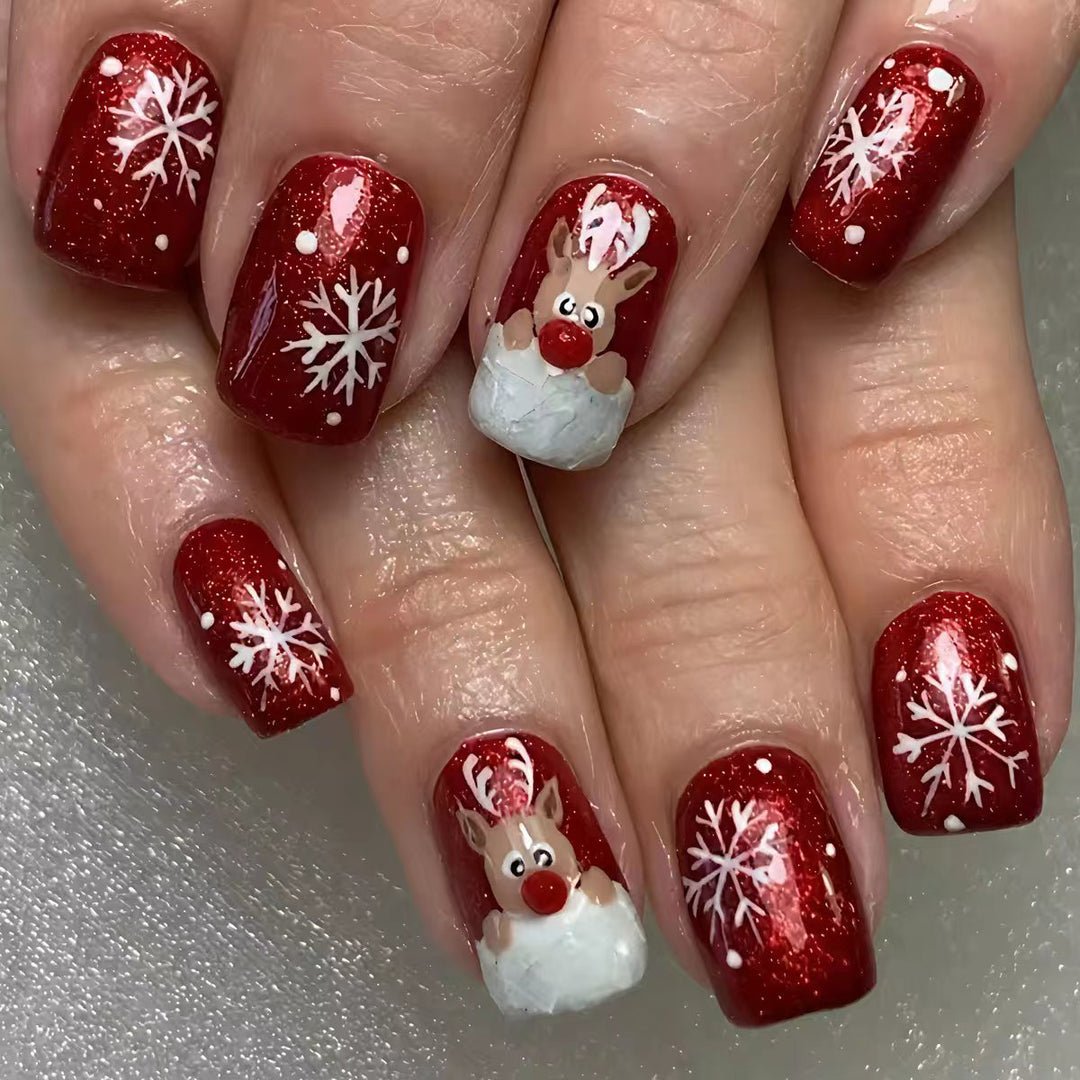 Artificial nails with festive reindeer design Bowlift