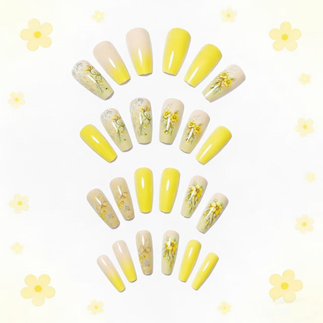 Artificial nails with floral embellishments and glitter Bowlift