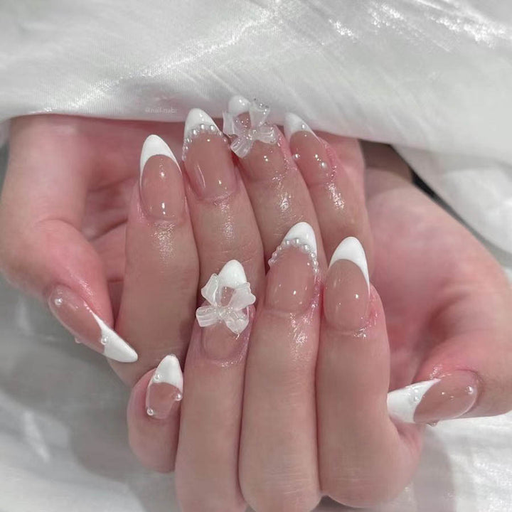 Nail art set with elegant tips and floral accents Bowlift