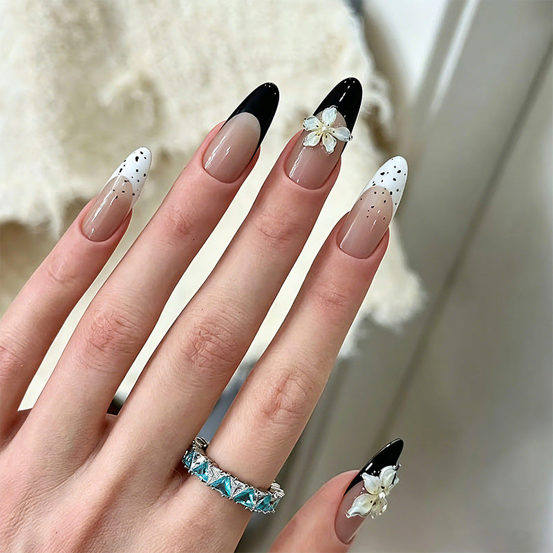Artful nail tips with floral embellishments Bowlift