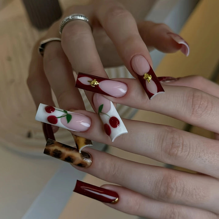 Artistic Cherry-Themed Nail Enhancements Bowlift