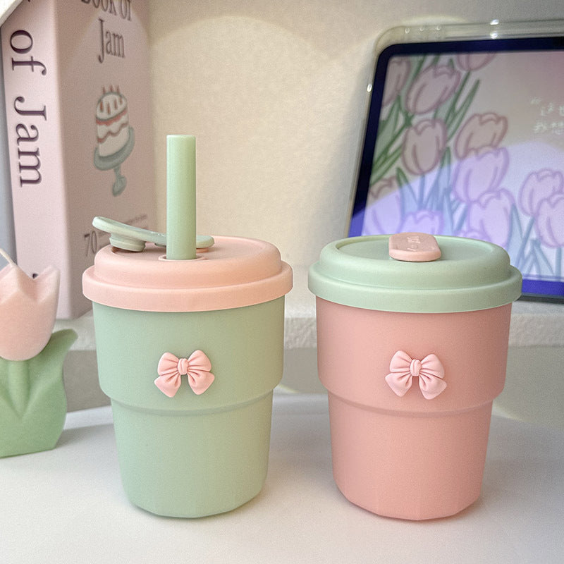 Women's Reusable Drinking Cup with Integrated Straw and Secure Closure Bowlift