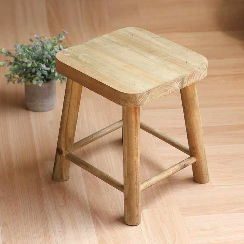 Robust stool made of solid wood Bowlift