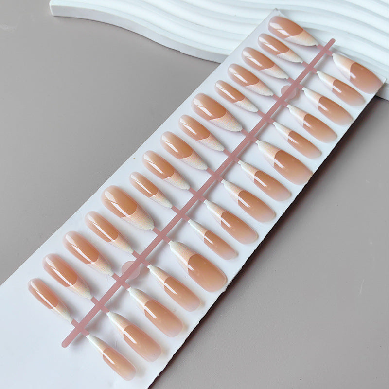 Artificial nails in the elegant French tip design Bowlift