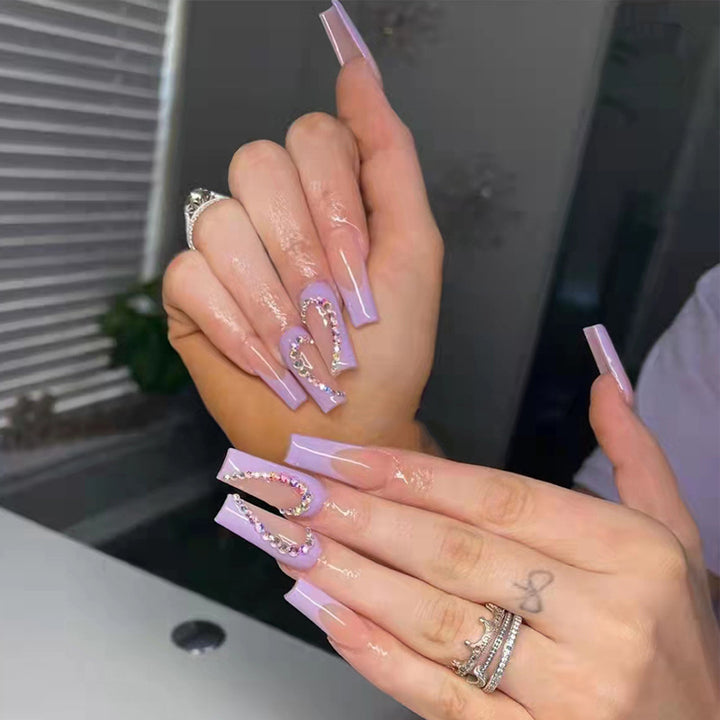 Nail art set with sparkling hearts and elegant glitter accents Bowlift