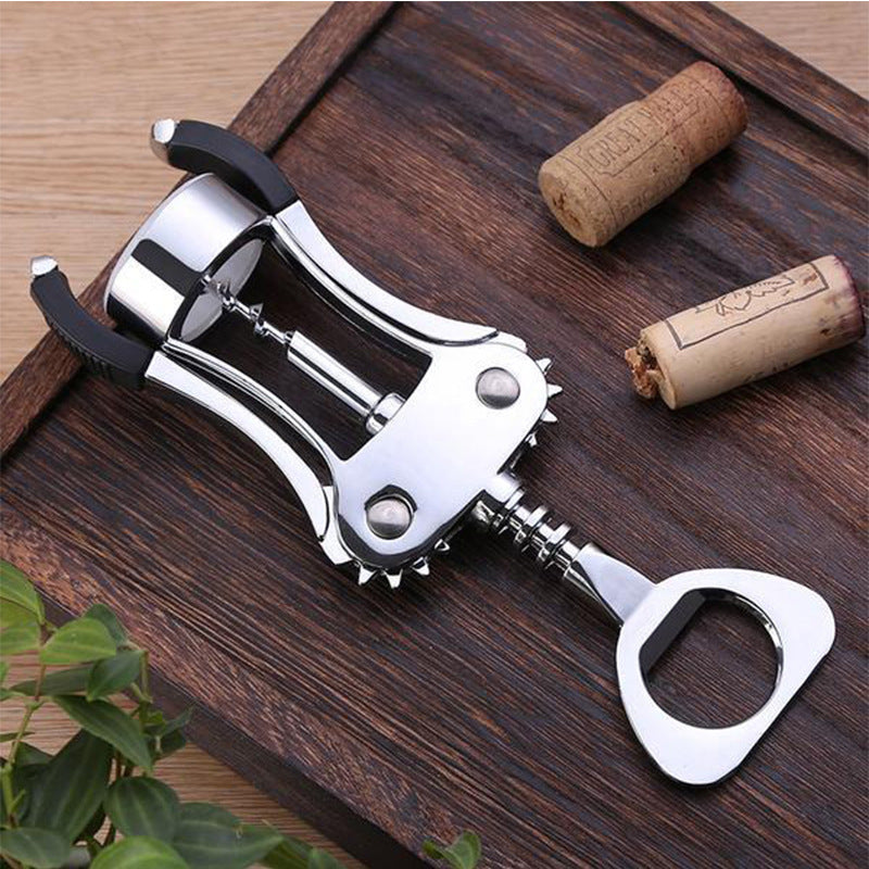 Winged corkscrew with integrated bottle opener and ergonomic rubberized lever handles Bowlift