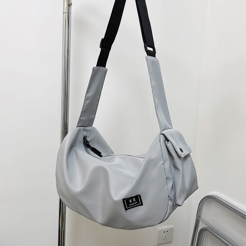Sporty shoulder bag with adjustable carrying strap Bowlift