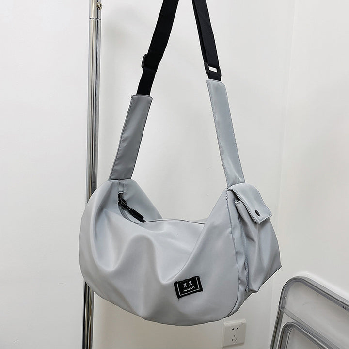 Sporty shoulder bag with adjustable carrying strap Bowlift