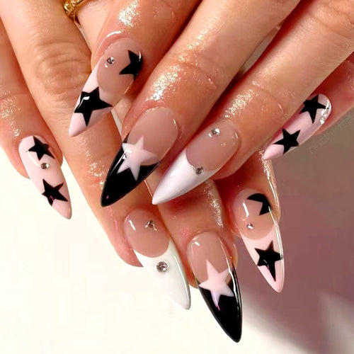Artistic stiletto nails with star motif Bowlift