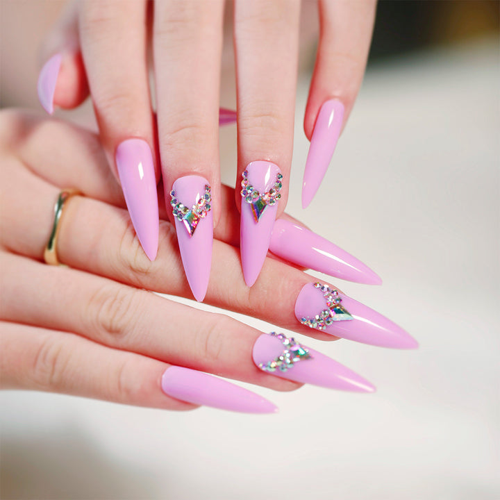 Glamorous stiletto nails with rhinestone decoration Bowlift