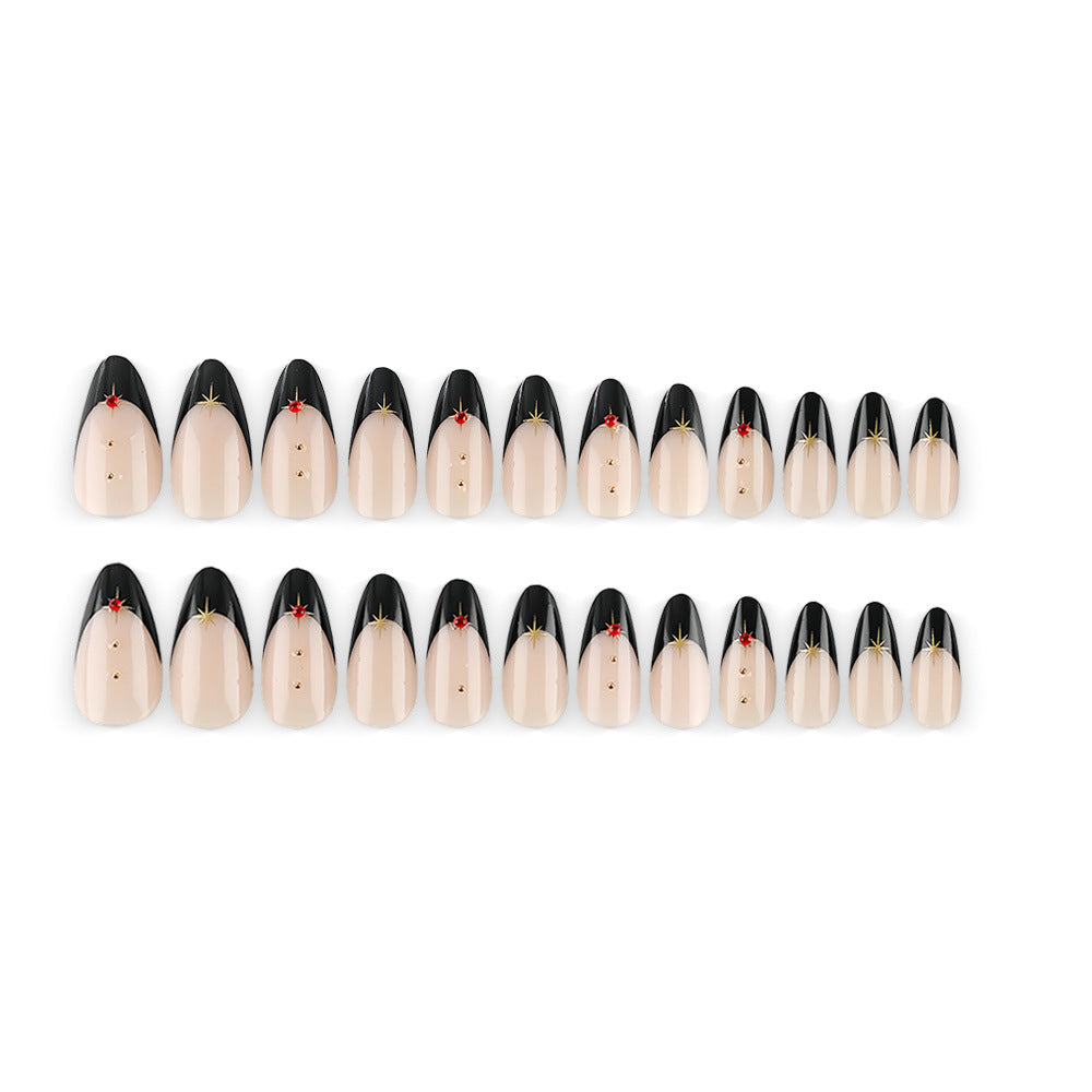Glamorous artificial nails in stylish stiletto design with golden accents Bowlift