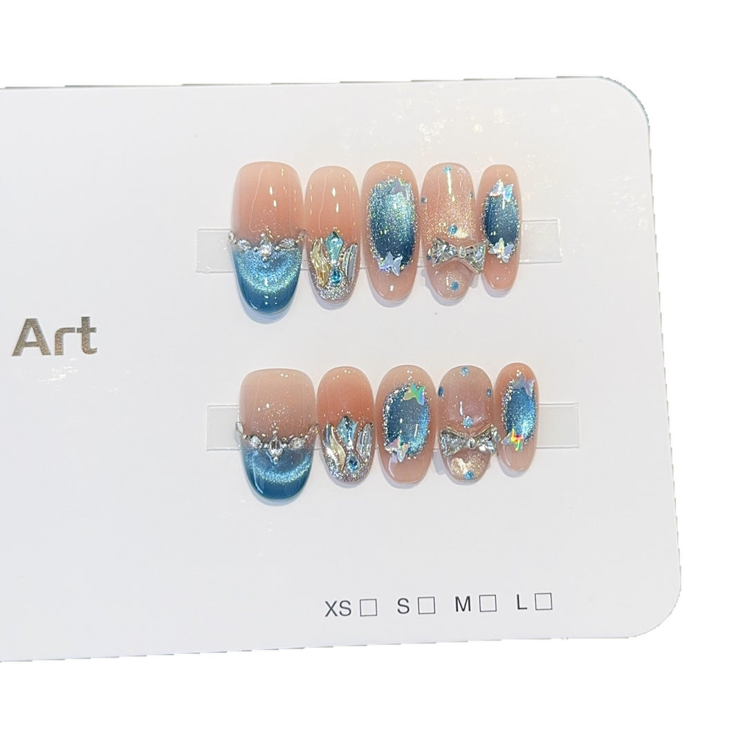 Artificial nail tips with glitter and watercolor effect Bowlift