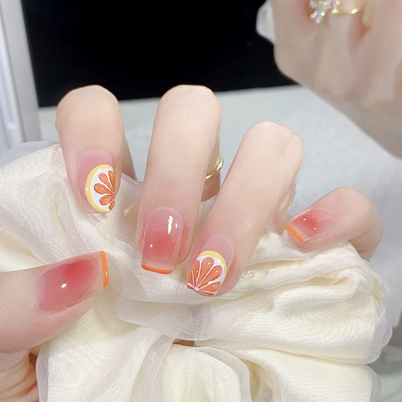 Glamorous artificial nails with delicate flower and glitter effects Bowlift