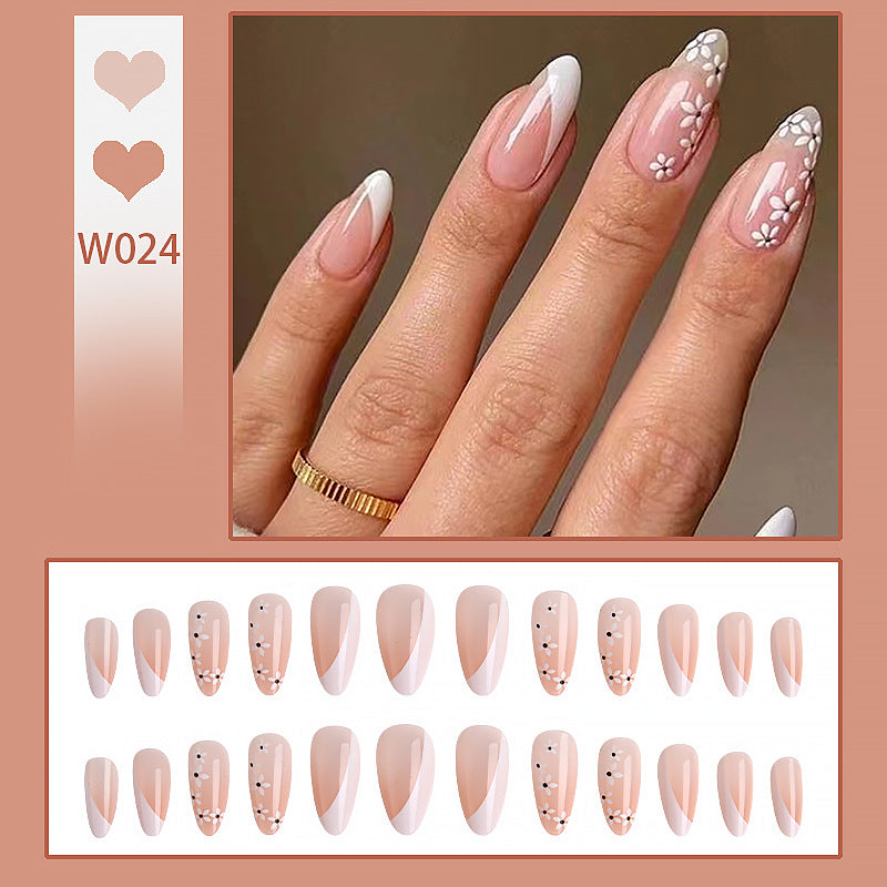 Artistic Nail Tips with Floral Accents Bowlift